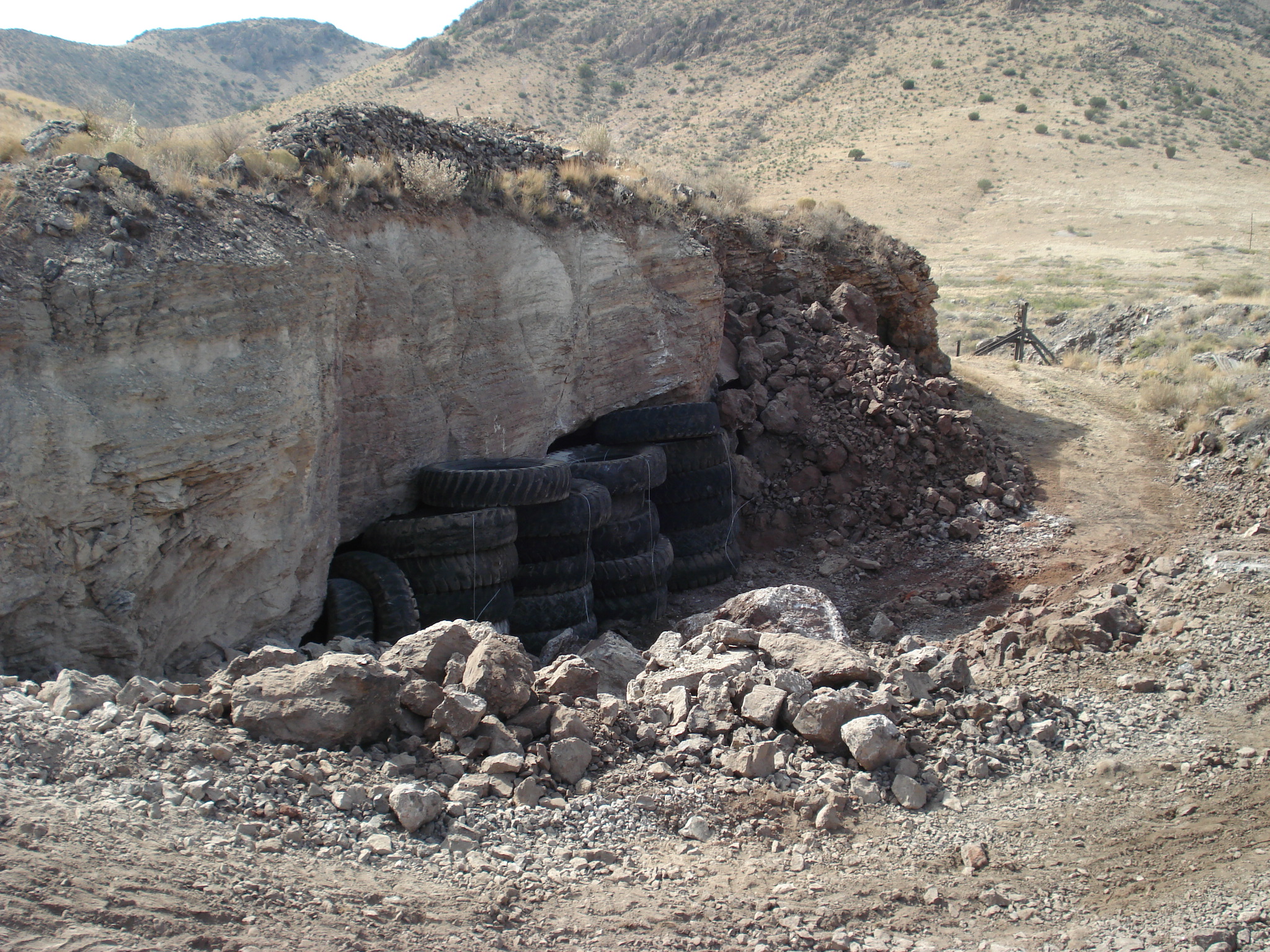 Earth-moving equipment tires used for toroidal tire plugging on a U.S. mine site.