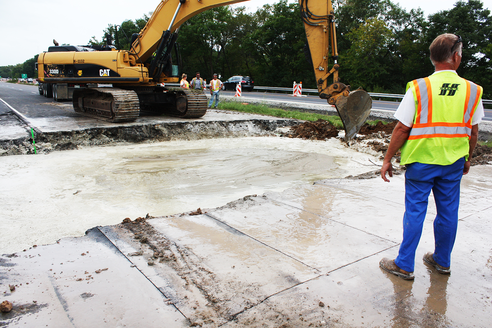 330 cubic yards of flowable fill placed to elevation of pavement subgrade.