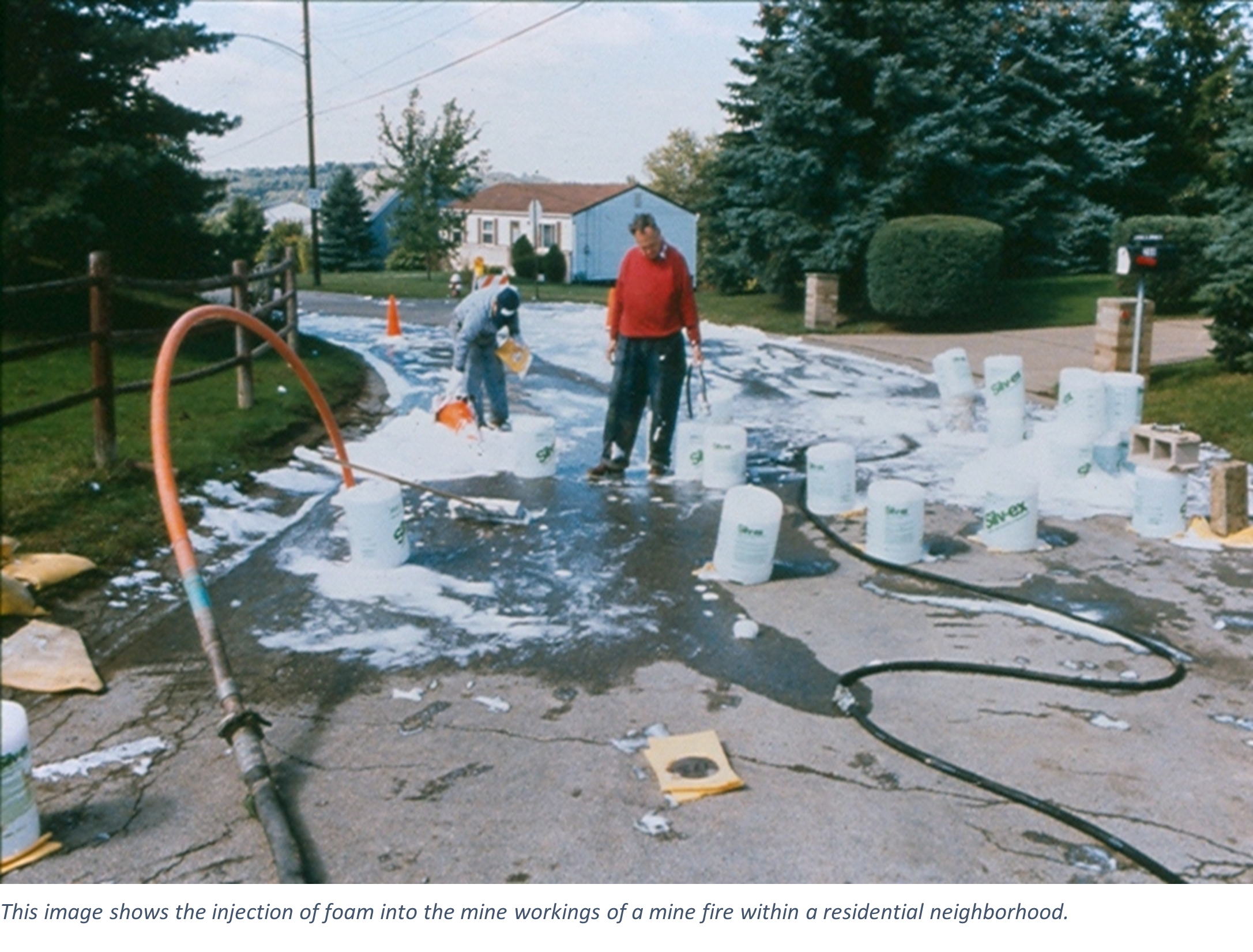 This image shows the injection of foam into the mine workings of a mine fire within a residential neighborhood.