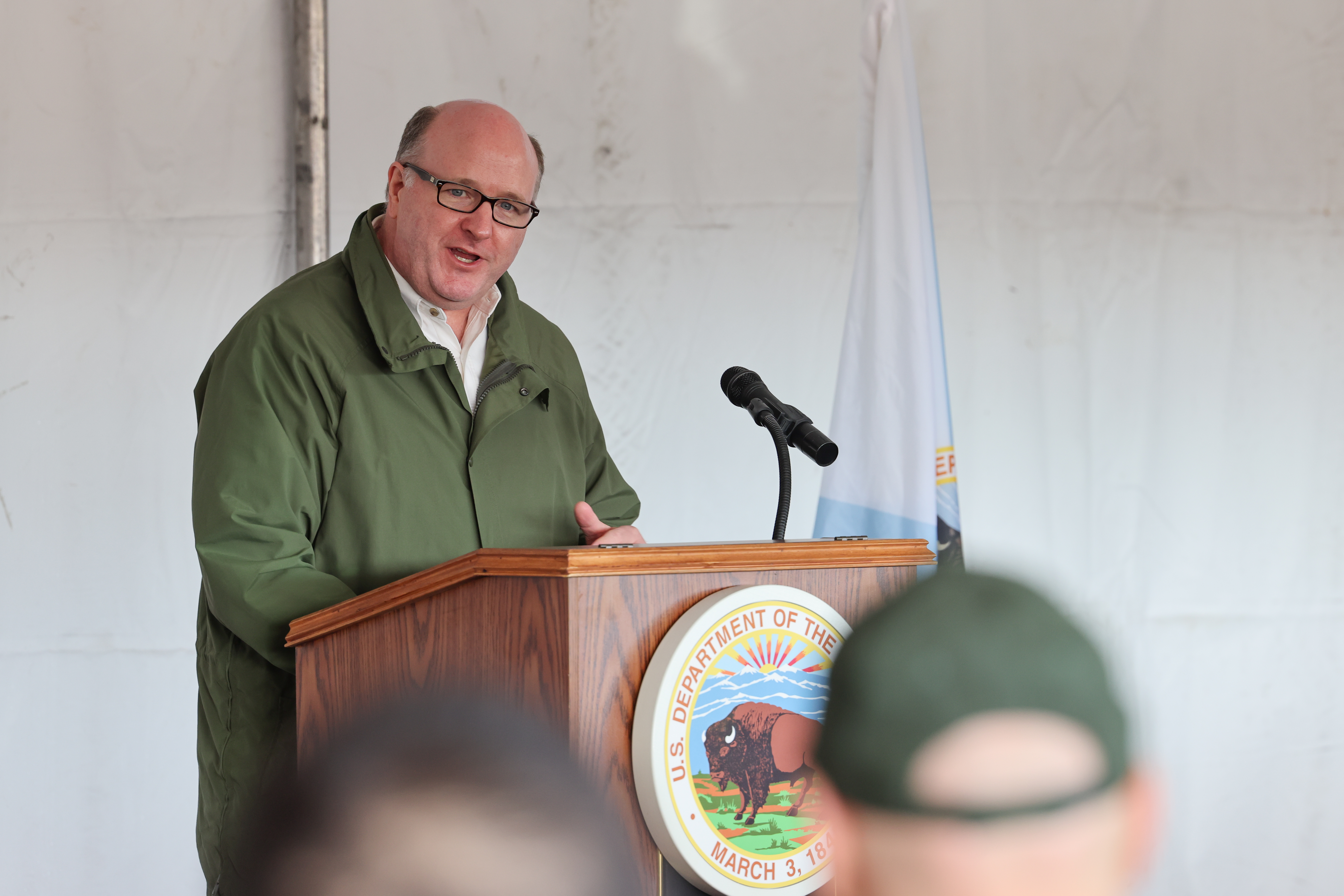 Tom Shope, OSMRE Regions 1 & 2 director and field special assistant to the secretary, speaks before the Plant a Tree at Flight 93 event at the Flight 93 National Memorial, Somerset County, Pennsylvania, April 22, 2022. The event highlighted more than 10 years of work and events to plant over 150,000 trees, across 214 acres of former coal mine land. (Photo courtesy of NPS/B. Torrey)