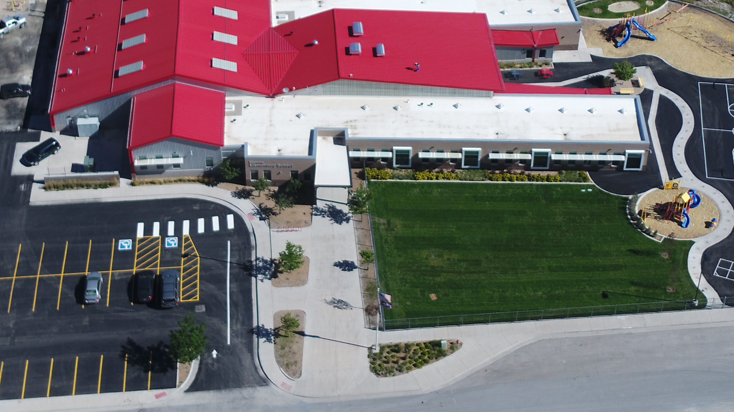Aerial view of elementary school and surrounding grounds.