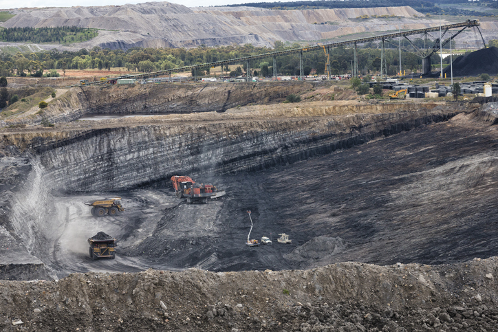 Image of an active surface coal mine with operating equipment
