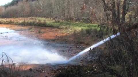 Pump shooting water at a Treatment site using AMDTreat